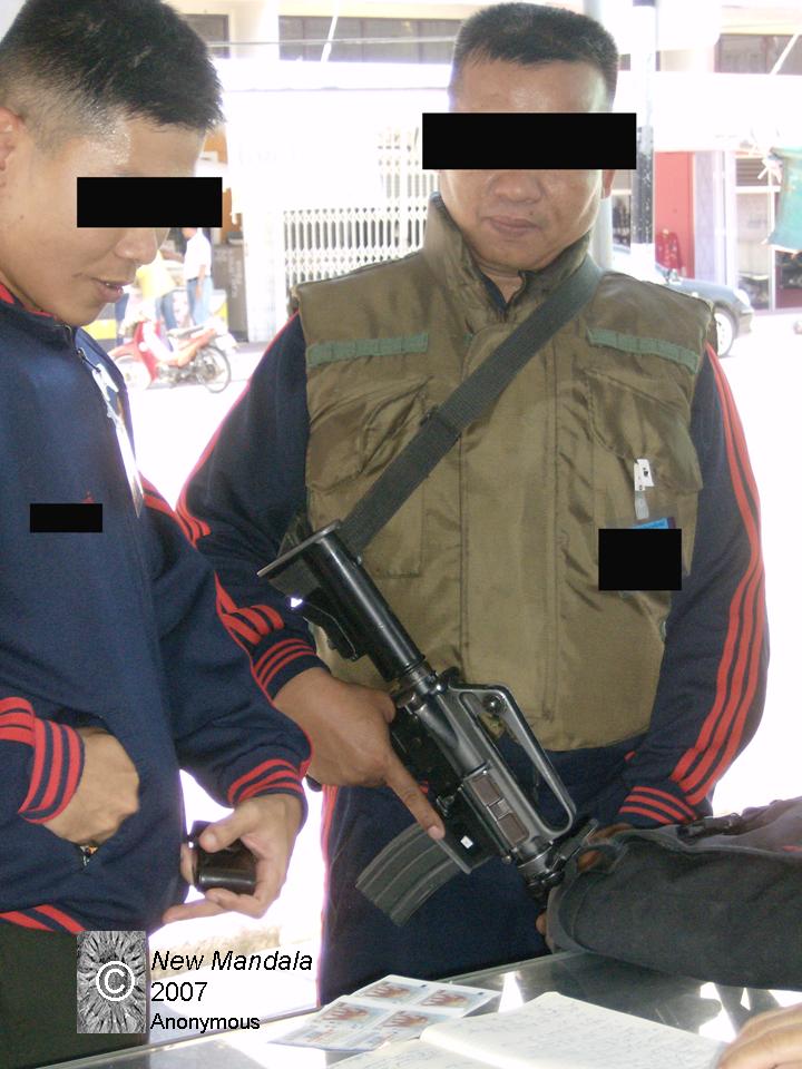 Soldiers buying lottery tickets New Mandala