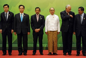 No longer the odd man out. Myanmar President Thein Sein (third from right) with Southeast Asian leaders at the 24th ASEAN summit. Photo by AFP.