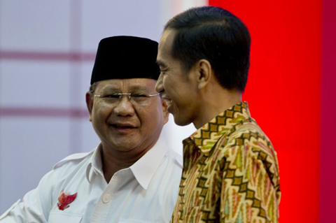 Retreating from the world? Indonesia presidential candidates Prabowo (left) and Jokowi. Photo by AFP.