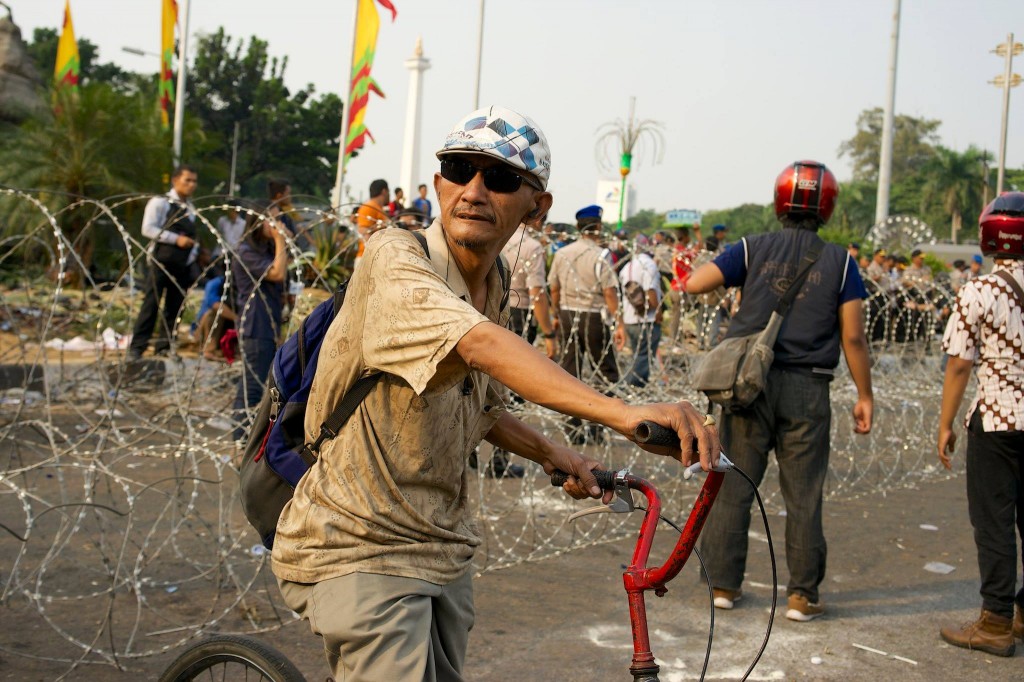 Shades and headphones. Security forces?