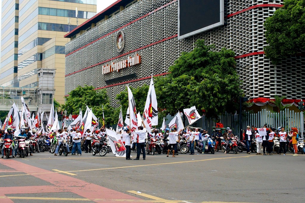 Some of Prabowo's 'scooter gang' get ready to roll to the court.
