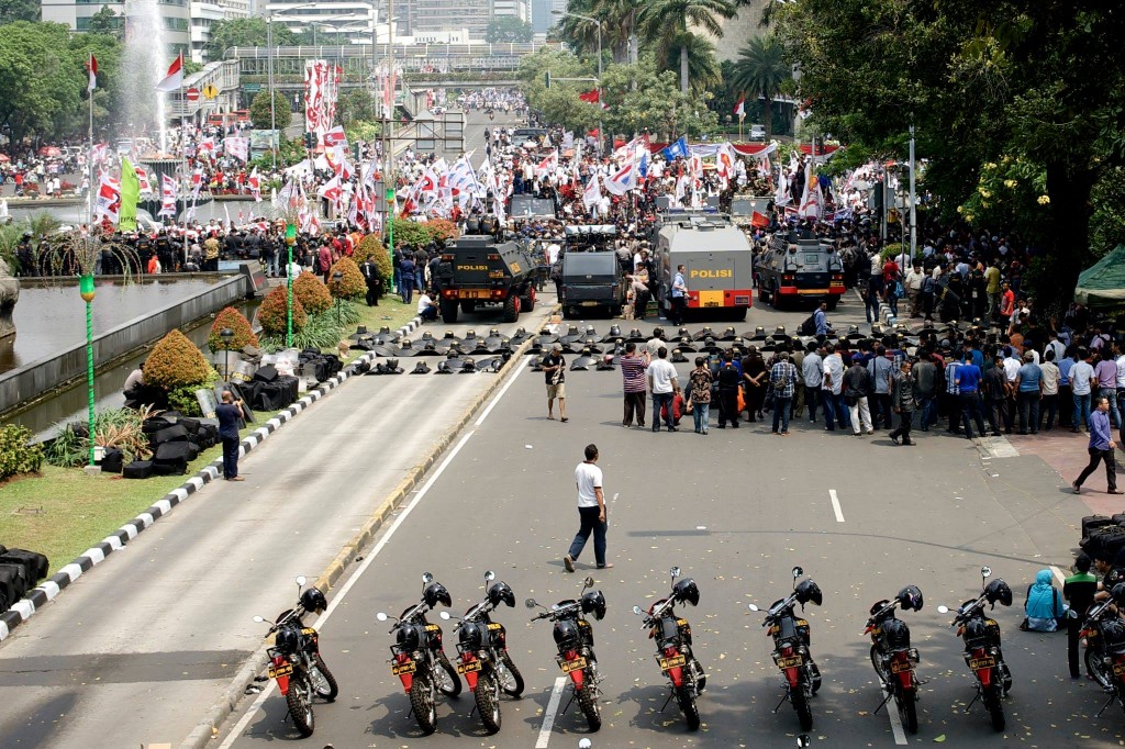 View of the demonstration from behind the barricade.