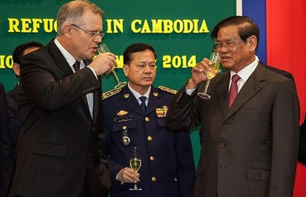Australian Minister of Immigration and Border Protection, Scott Morrison (L) and Cambodian Minister of the Interior and Deputy Prime Minister, HE Sar Kheng (R), toast the signing of the “Memorandum of Understanding” relating to the resettlement of refugees.