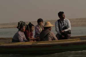 Myint Zaw (right) travels along the Irrawaddy river. Photo courtesy of Goldman Environmental Prize.