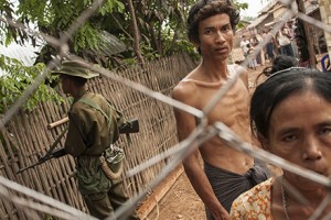 Squatters on the edge of Yangon. Photo by Boothe Thaik Htun.