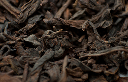 Puer tea leaves. Photo by Toby Oxborrow on flickr https://www.flickr.com/photos/oxborrow/ 