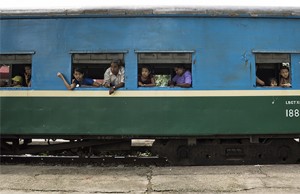 Passengers on a train. Photo by James Walsh.