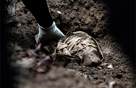 Human remains found in a mass grave at a human trafficking camp in Malaysia. Photo by Al Jazeera.