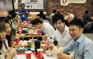 People eat at Yangon's KFC. Photo by AFP.