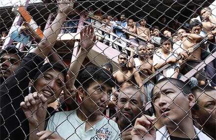 Men in an immigration detention centre, Malaysia. Photo by AP. 