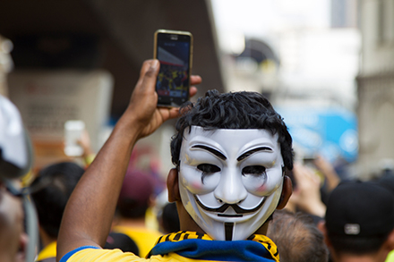 Selfies and Guy Fawkes masks  featured at Bersih 4. Photo: Getty Images. 