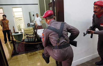 A re-enactment from the failed coup of 1965 at Indonesia's national monument.