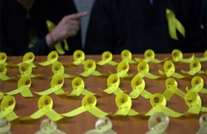 Myanmar's yellow ribbon campaign highlighted military appointments to the judiciary. Photo: AFP.