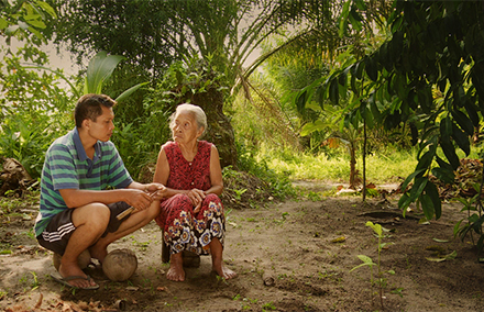 Adi Rukun, the protagonist in 'The Look of Silence' speaks to his mother. Image: thelookofsilence.com