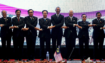 ASEAN leaders gather for a family photo with U.S. President Obama after a US-ASEAN meeting at the ASEAN Summit in Kuala Lumpur