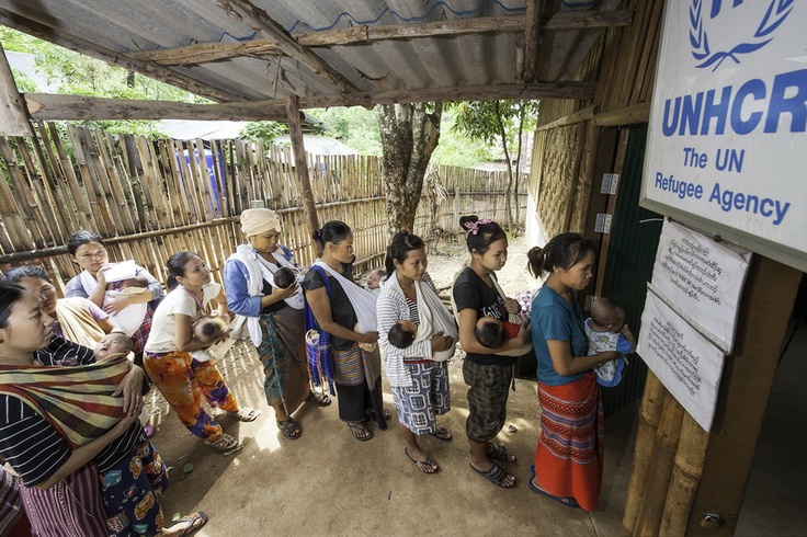 May 24, 2012 - Mae Sot, Tak Province, Thailand - Moms stand with their new born babies to register them at the Birth Registration Office of UNHCR inside the Mae La refugee camp in Mae Sot near the Thai-Myanmar border on May 24, 2012. More than 140,000 refugees have been living in nine refugee camps scattered along the border in Thailand after the minority ethnic group fled their country in 1995 following a major offensive by the Myanmar government army against the Karen National Union. Photo Credit: UN Photo/Kibae Park