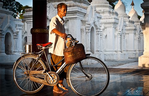 Man with his bike. Photo by Staffan Scherz on flickr.