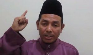 Abdul Karim Khalib of the Barisan Revolusi Nasional (BRN) rebel group criticizes Thai тАЬcolonialismтАЭ in a six-minute video posted online 7 September. Photo from YouTube.