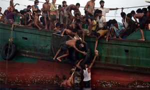 Rohingya stranded off the coast of Thailand in May. Photo: Christophe Archambault/AFP.
